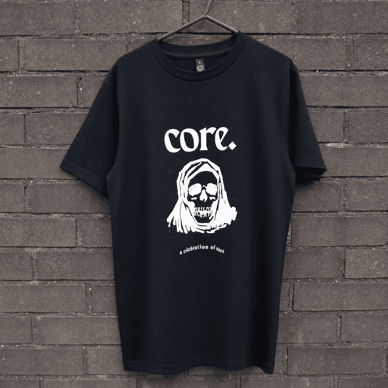 Black Core T-shirt with a white skull design